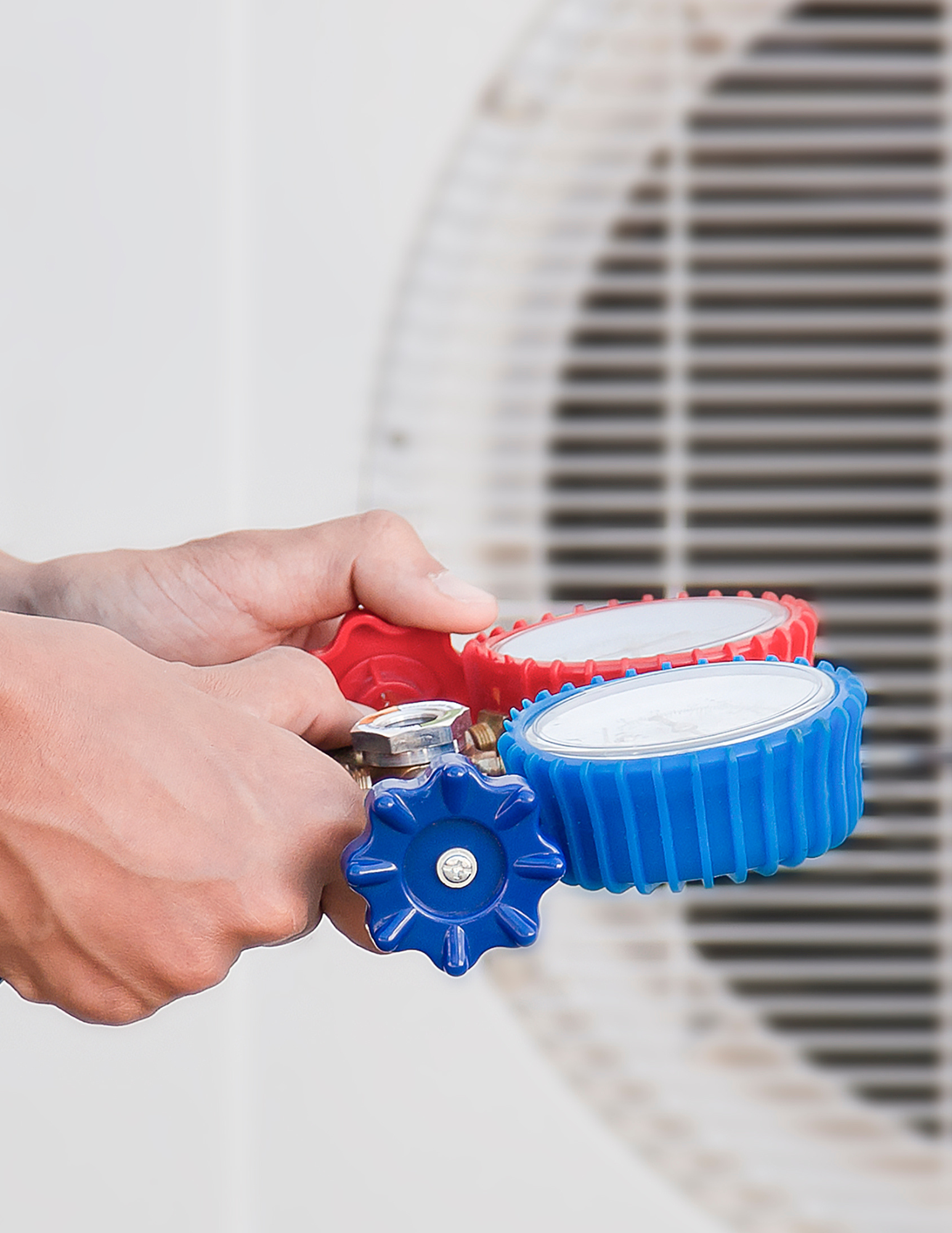 Air Conditioning Service technician testing 