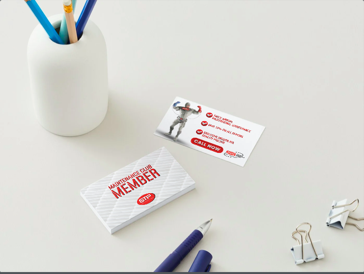 STP HVAC Maintenance Club card on a desk